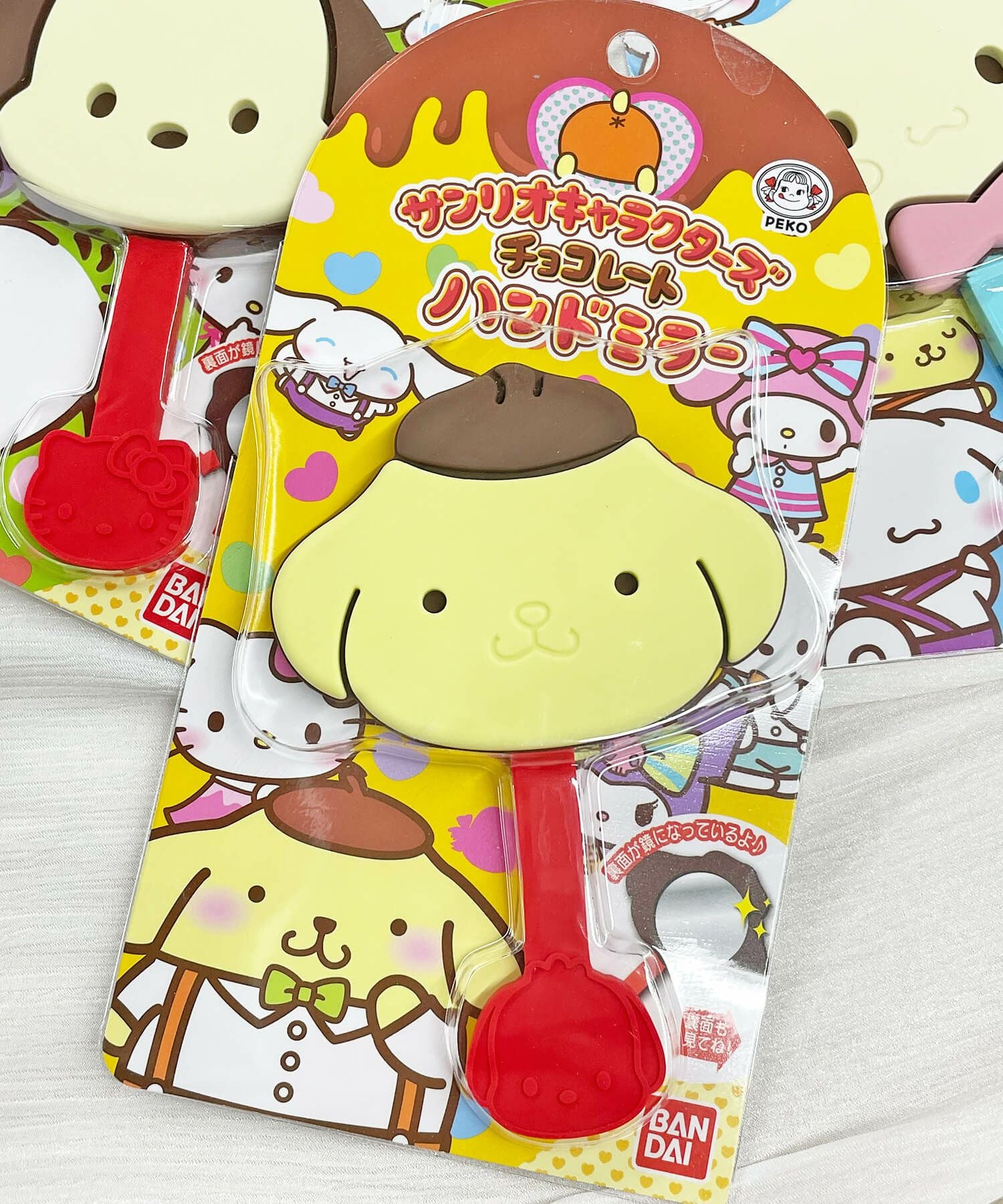 新品　チョコレートハンドミラー バンダイ 商品・サービスサイト | サンリオキャラクターズチョコレート