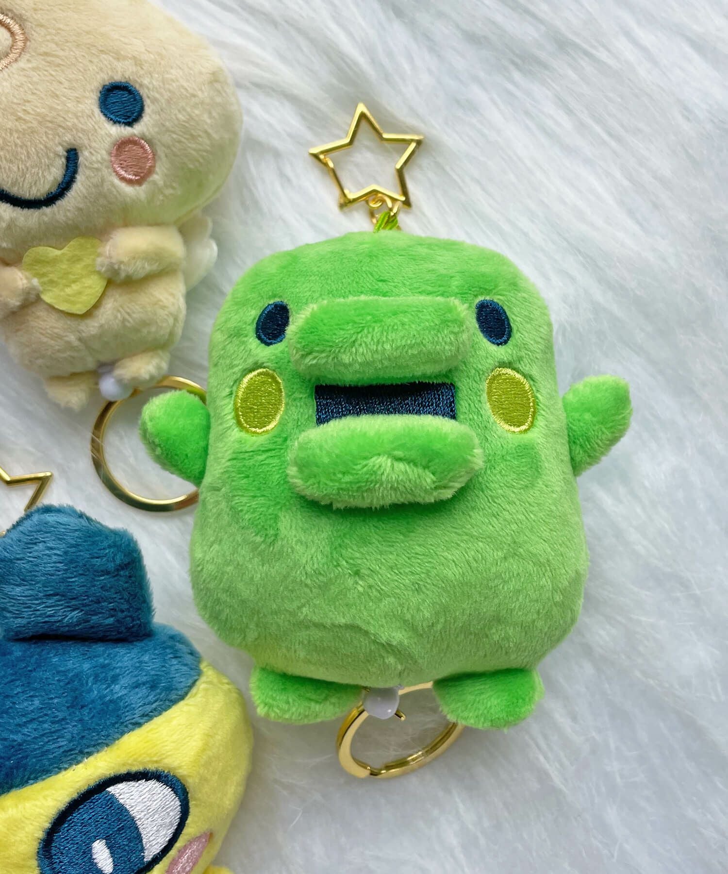 ≪たまごっち≫リール付きマスコット/ぬいぐるみキーホルダー | SPINNS